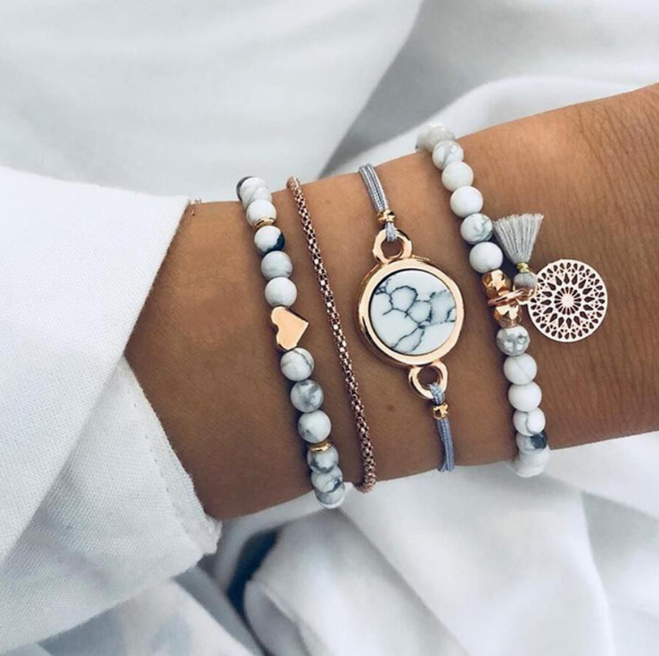 Geometric creative hollow flower fringed pine stone road ball love bracelet four-piece (White)